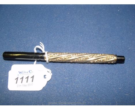 A vintage Gold plated, embossed overlay pattern Fountain Pen, maker unknown, black top