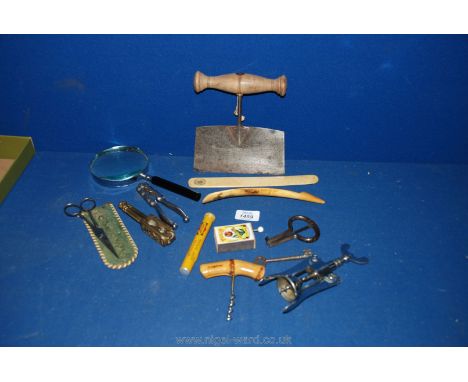 A steel Chopper with turned wood handle, bottle openers, Jews harp, shoe horn, etc.