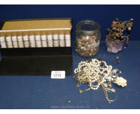 A vintage Homeopathy set by Nelson & Co together with a small box of costume jewellery etc.