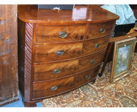 A good Victorian Mahogany bow fronted Chest of two short over three long graduated Drawers, the rounded corner top over plain