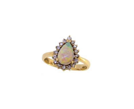 An opal and diamond cluster ring, pear shaped opal, approximately 9 x 6mm, head dimensions 14.2 x 10.4mm, size N½, unhallmark