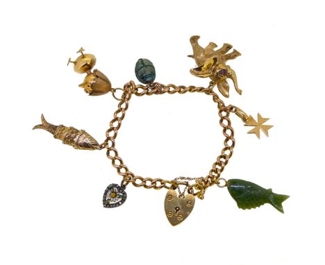 A charm bracelet, consisting of seven charms, including a nephrite jade fish and a scarab beetle, length 18cm, hallmarked Bir