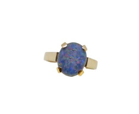 A 9ct gold opal doublet ring, oval shaped opal doublet, approximately 11.8 x 10mm, size P, hallmarked London, 9ct gold, weigh