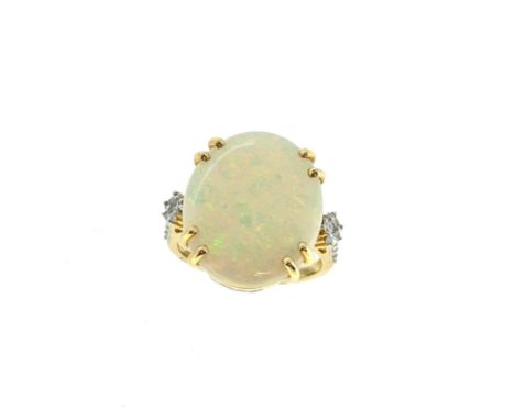 An 18ct gold opal and diamond ring, estimated approximate weight of opal 6.80ct, diamond set shoulders, size N, hallmarked Bi