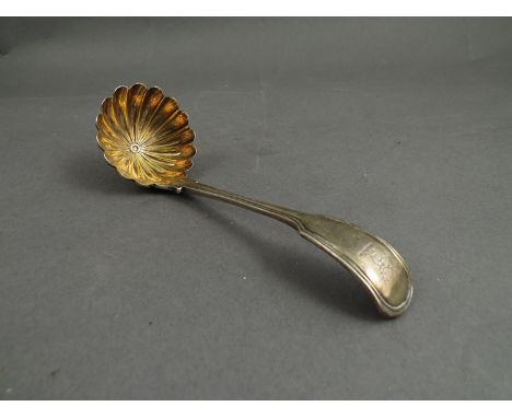 A John and Henry Lias silver sauce ladle with shaped gilt bowl, London 1845, 71g