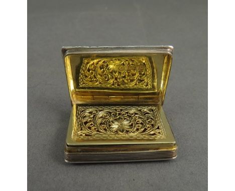 A William Simpson silver vinaigrette engine-turned detail, embossed borders, gilt interior, Birmingham 1835, 23g