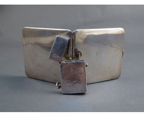A silver cigarette case, Birmingham 1919, maker's mark W N Ltd and monogrammed lighter (2) 123g
