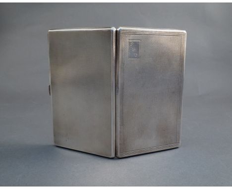 A silver cigarette case with engine turned detail monogrammed cartouche, inscription to the interior, Birmingham 1936, 190g