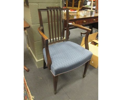 A George III mahogany rectangular tripod table and a Regency open armchair