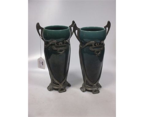 A near pair of Art Nouveau vases