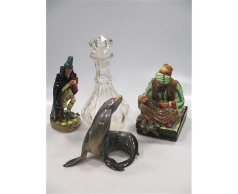 A Bing and Grondahl figure of a seal, marked 1733, 20 x 18 cm; together with two Royal Doulton figures of the Cobbler and the
