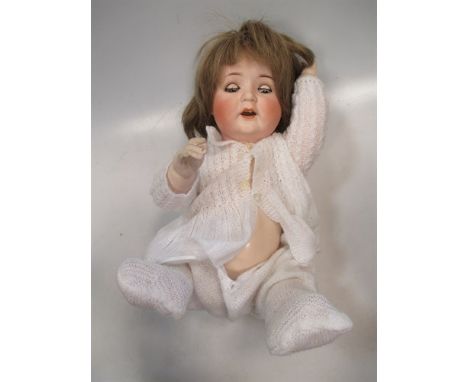 A German bisque head doll