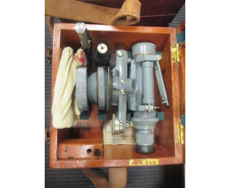 A simple microscope, dumpy level and another level by Troughton &amp; Sims