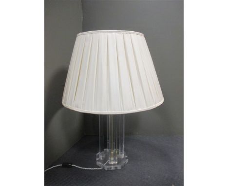 A modern Lucite table lamp