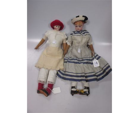 A wax head doll, a bisque shoulder headed doll and other parts