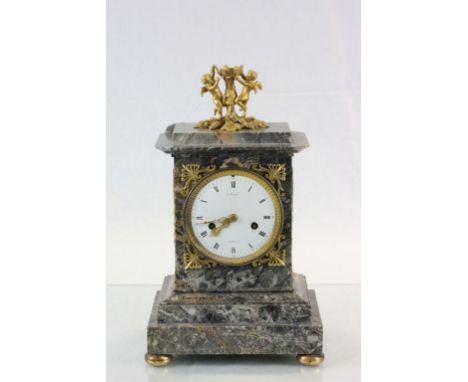 A nineteenth century French grey marble mantle clock by le Paute, a Paris white enamel dial with black Roman numerals and sil