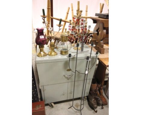 Collection of Eight Candle Stands including Gilt Metal and Ceramic Flower Candle Stand, Pair Brass Candle Stands with Red Gla