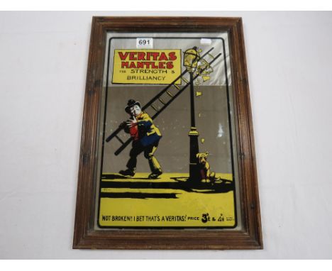 A vintage Veritas Mantles advertising mirror.