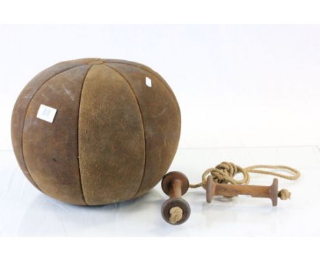 Vintage leather Medicine ball and a vintage skipping rope with Industrial bobbin handles