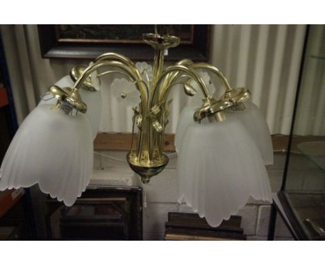 A contemporary ceiling light chanderlier style with shades.
