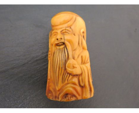 Bone netsuke of a wise man