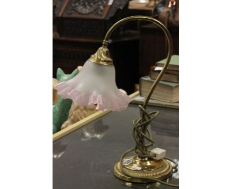 Brass table lamp with pink glass shade