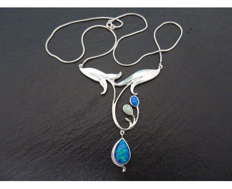 A silver art nouveau style opal set pendant necklace 