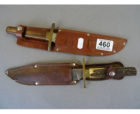 Two vintage Bowie type knives with leather sheaths