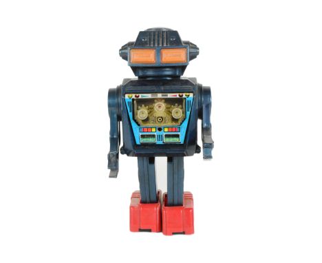 Retro Toys - a vintage Japanese Junior 'Dynamic Fighter' robot. Featuring a plastic body, tinplate chest cavity and shooting 