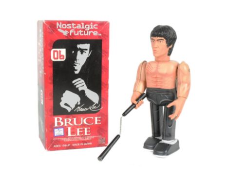 Tinplate Toys - a Japanese Medicom Bruce Lee robot, featuring walking action and swinging arms, with original key and accesor