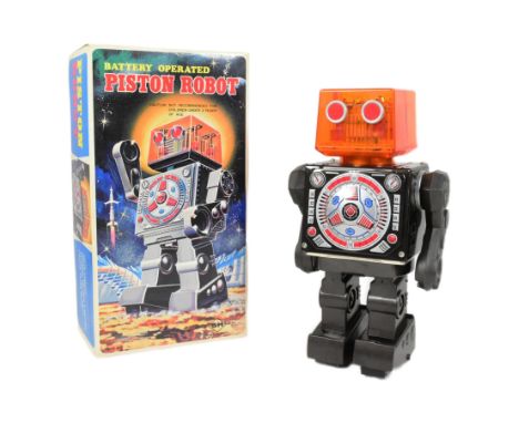 Tinplate Toys - a vintage Japanese SH Horikawa battery operated Piston Robot, featuring see through head and pistons. Tested 