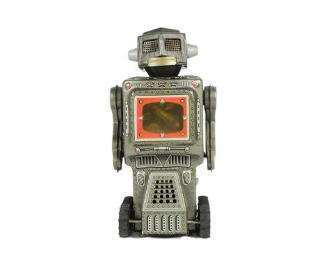 Tinplate Toys - a vintage Japanese SH Horikawa Mars King robot. Featuring TV screen, moving arms, rolling tredmill wheels and