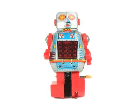 Tinplate Toys - a vintage 1960s Japanese Noguchi Space Robot RX-008. Featuring walking action and sparking within the chest c