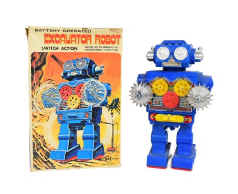 Retro Toys - a vintage Japanese SH battery operated Excavator Robot, with switch action. In good condition, with clean batter