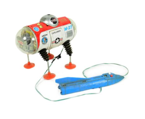 Tinplate Toys - a vintage 1960s Japanese Yonezawa Moon Explorer M-27 robot. Featuring separate blue rocket battery compartmen