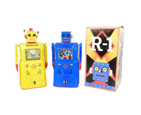 Tinplate Toys - x2 vintage Rocket USA R-1 robots, comprising of an unboxed 2003 R-1 Rescue yellow robot and a boxed 2001 R-1 