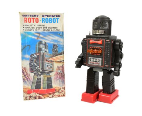 Tinplate Toys - a vintage Japanese SH Horikawa Roto Robot, featuring walking action, rotating torso and shooting with sounds 