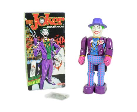 Tinplate Toys - a Japanese 1989 Billiken Shokai Joker mechanical robot. Tested and in working condition, with walking mechani