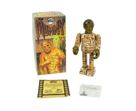 Tinplate Toys - a 1991 Japanese Universal Studios The Mummy wind-up robot. Tested, in excellent, working condition with swing