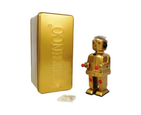 Tinplate Toys - a 2004 Strauss Toys Strenco wind-up robot, in gold. Featuring walking action, and sparking inside the torso. 