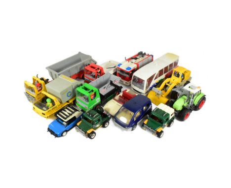 Playmobil - a collection of assorted Playmobil vehicles to include; Fire Engine, 4x4, Jeep, Tractor, Travel Bus / Coach, Cons