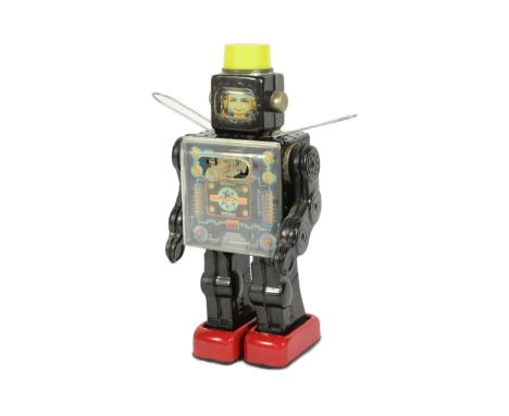 Tinplate Toys - a vintage Japanese SH Horikawa Fighting Space Man robot. Featuring a tinplate body, a see-through plastic bod