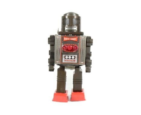 Tinplate Toys - a vintage Japanese SH Horikawa Roto Robot, featuring walking action, rotating torso, shooting action and soun