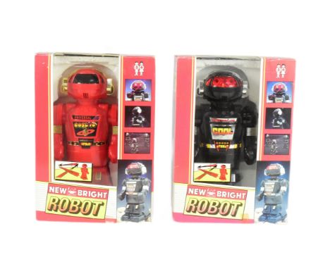 Retro Toys - x2 Chinese New Bright Robots, no.300, featuring bump and go action. Tested and both are in working order. Housed