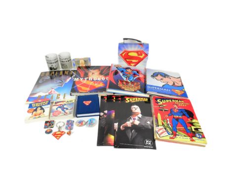 Superman - a collection of assorted Superman memorabilia to include hard and paper back books, tin lunchbox, glass tumblers, 