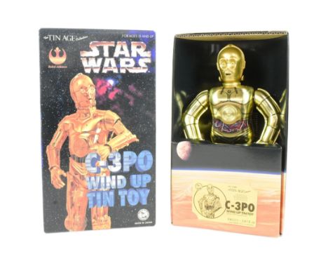 Tinplate Toys - a vintage Japanese Star Wars 'C-3PO' wind-up tin toy robot by Osaka Toy Institute 1997. Featuring walking act