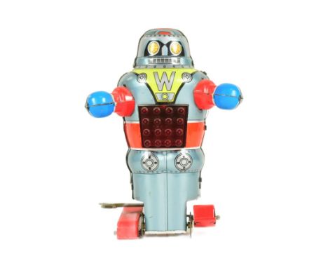 Tinplate Toys - a vintage 1950s Japanese Noguchi wind-up sparking robot, featuring walking action and sparking within the che