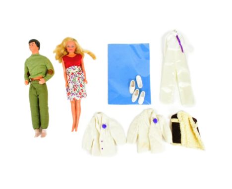 Barbie - and original vintage Mattel made Barbie doll together with a ' Day To Night ' Ken doll and a selection of clothes an