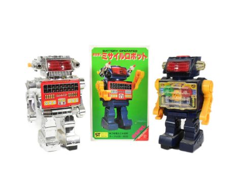 Retro Toys - x2 Vintage Japanese Yonezawa robots, featuring a missile robot, housed within an associated box and a gear robot