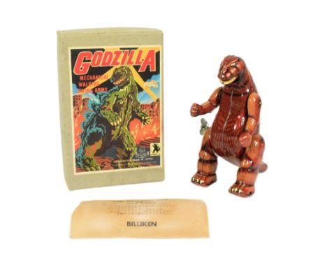 Tinplate Toys - a Japanese Billiken Shokai Godzilla mechanical robot. Featuring moving legs, arms and mouth. Tested and is in